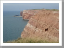 Die roten Felsen der Insel